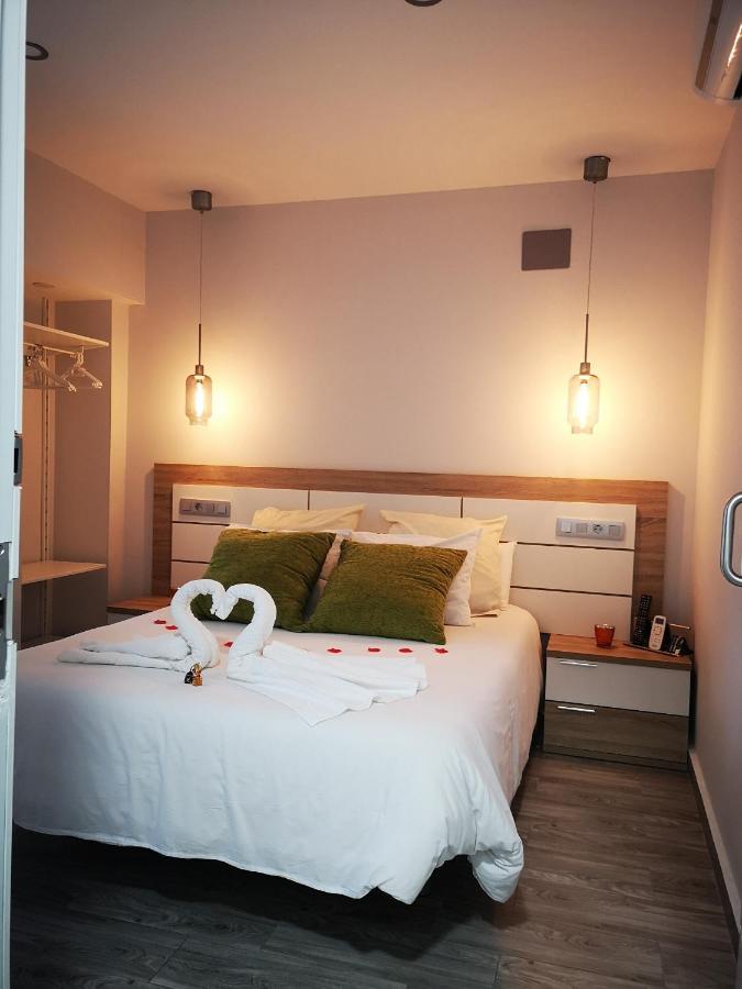Eres Emerita "Apartamentos & Suites" Mérida Luaran gambar